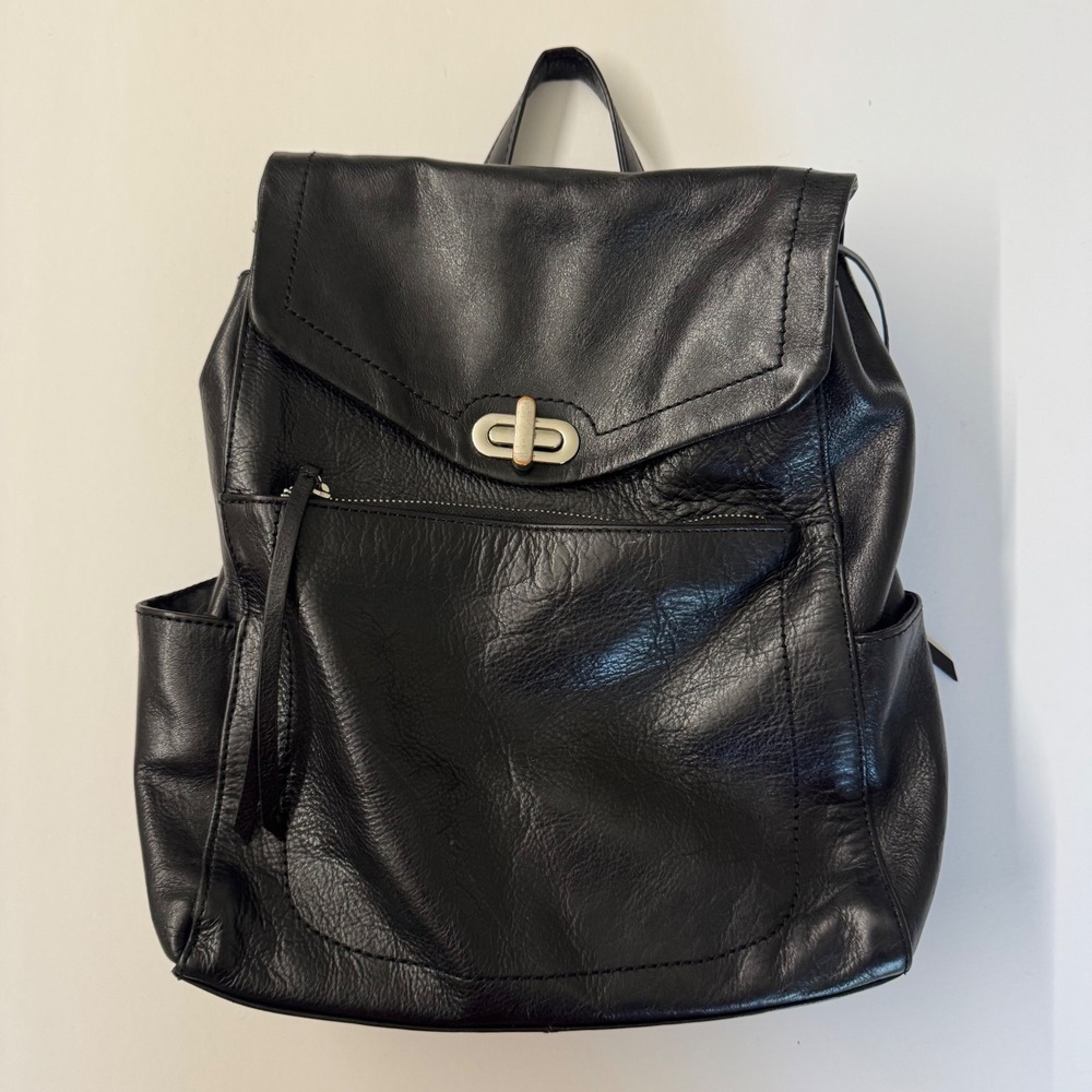 Wilsons Leather Black Genuine Leather Backpack Turn Lock Flap Bag Pocket